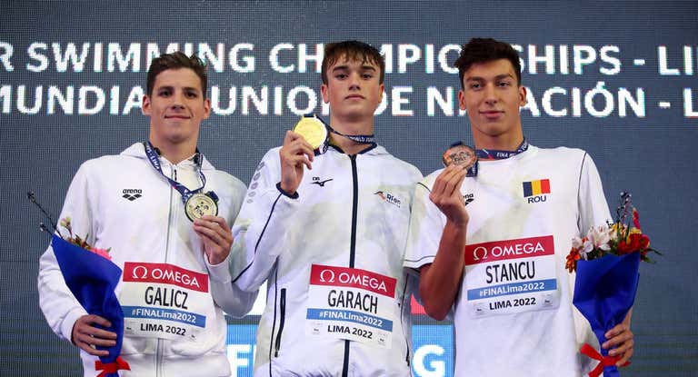 Laszio Galicz (plata), Carlos Garach (oro) y Vlad Stancu (bronce) en los 1.500 libres de Mundial Júnior de Lima 2022.