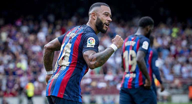 Memphis celebra un gol con el Barcelona esta temporada.