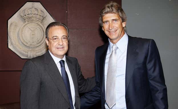 Florentino Pérez y Manuel Pellegrini durante la presentación del chileno. Getty