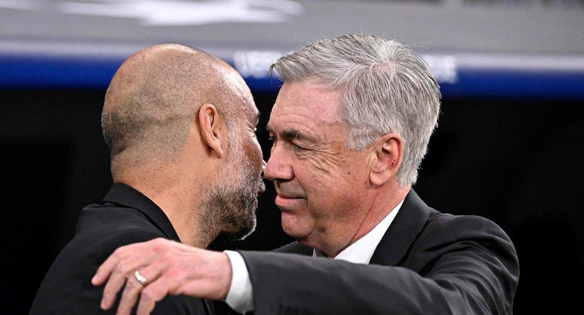 Pep y Carlo se saludaron antes del partido en el Santiago Bernabéu. /REUTERS