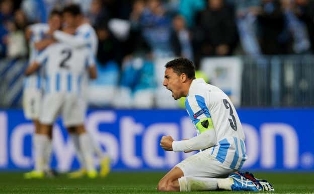 Weligton celebrando el pase a cuartos de final de la Champions con el Málaga  GETTY