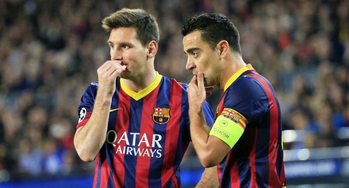 Leo Messi y Xavi durante un partido de Champions con el Barça./AGENCIAS