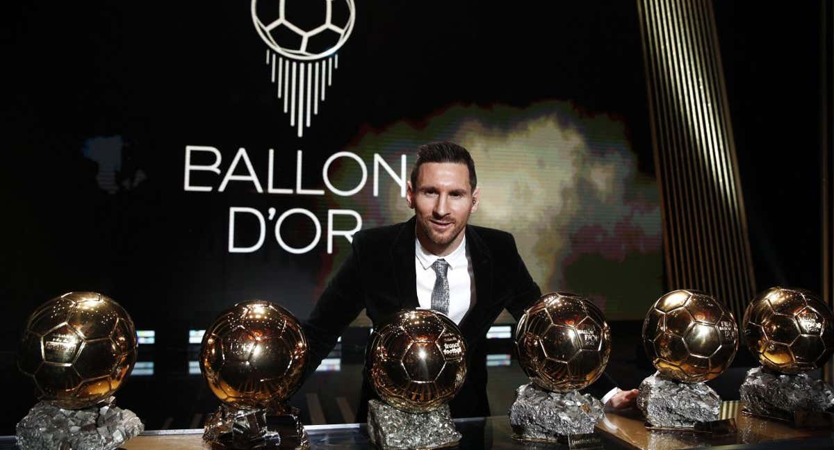 Messi, con sus Balones de Oro./AFP
