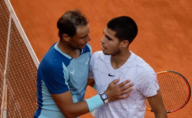 Alcaraz y Nadal, durante su partido en el Mutua Madrid Open 2022.