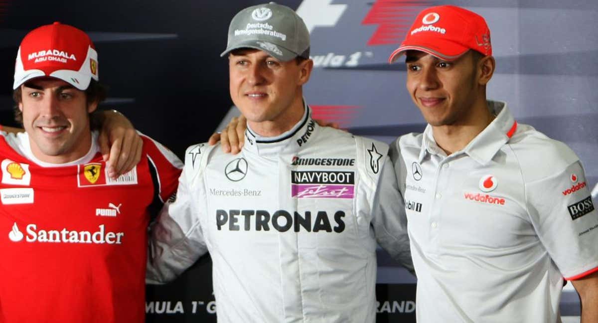 Fernando Alonso, Michael Schumacher y Lewis Hamilton./AFP