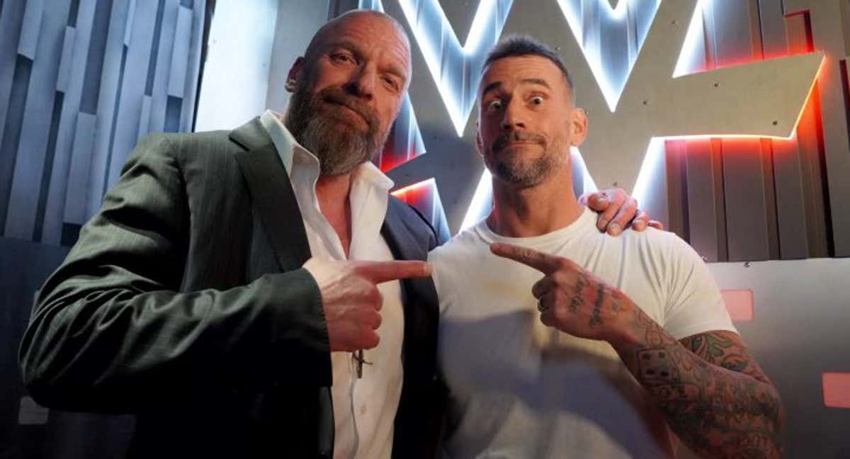 Triple H y CM Punk./WWE