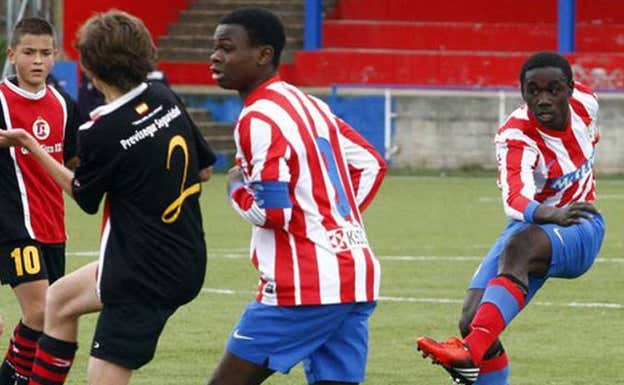 Los hermanos Obama en el Atlético de Madrid. ABC