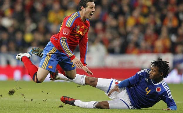 Cuadrado durante un partido con Colombia. Reuters