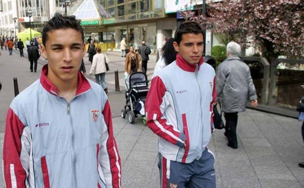Jesús Navas con Saviola.