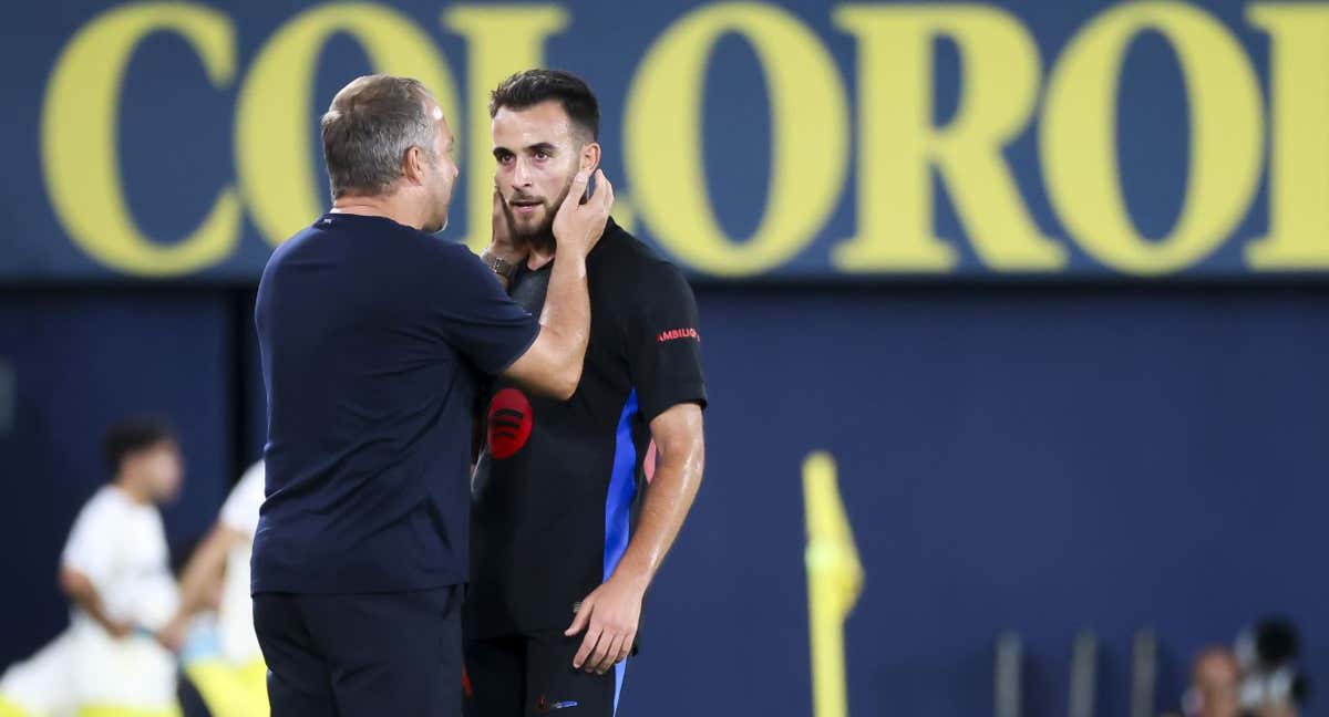 Hansi Flick y Eric García en uno de los partidos de esta temporada. /GETTY