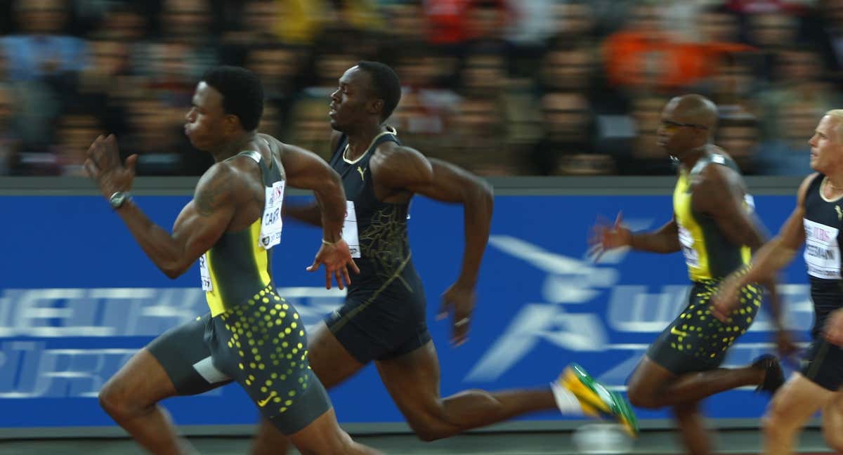 Xavier Carter, por delante de Usain Bolt./GETTY