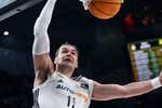 Un Real Madrid liderado por Hezonja logra derribar el muro defensivo de Baskonia y mantiene el liderato