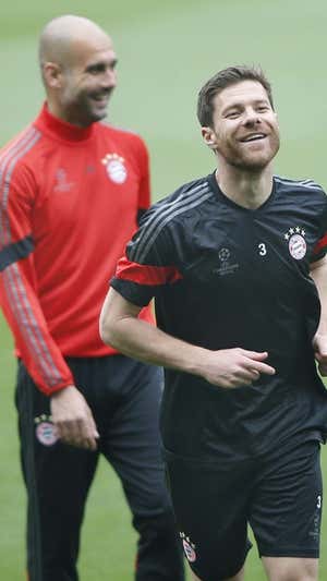 Xabi, junto a Guardiola en el Bayern.